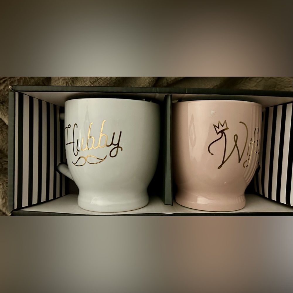 New in box. (2) mugs Hubby and Wifey. Box is a bit worn but mugs are new.